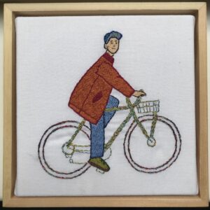 Bike hand embroidery on canvas in frame