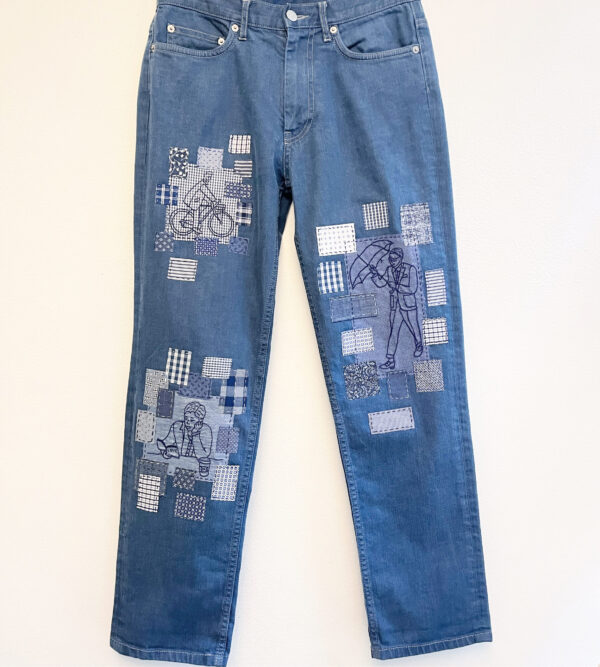 Jeans with hand embroidery and patches